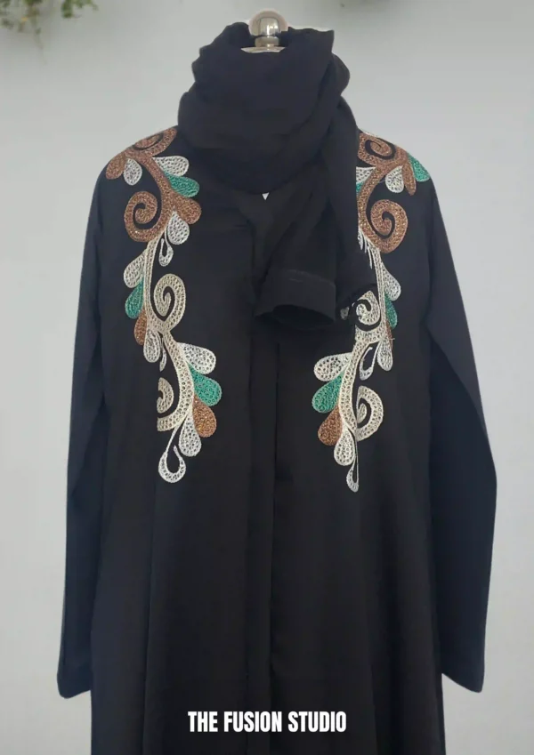 Elegant Black Abaya with Green Embroidery – stylish free size abaya perfect for casual and formal occasions. Soft breathable fabric. Buy online at ₹2,199