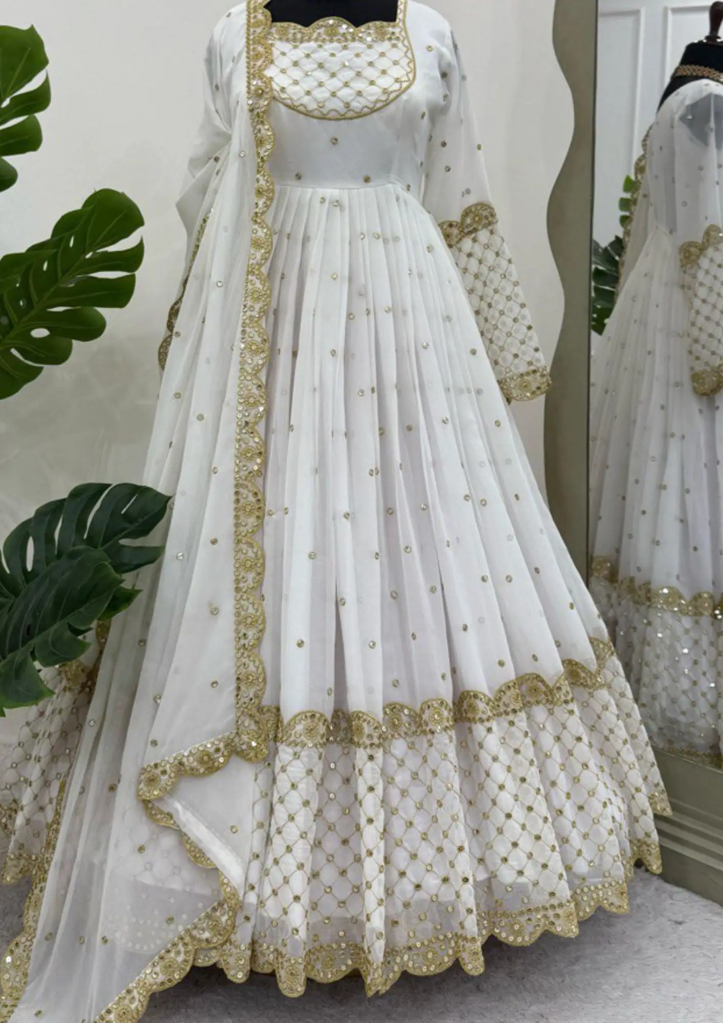 White & Gold Embroidered Anarkali Suit – Elegant Designer Gown for Weddings and Festive Wear 2025
