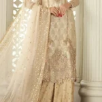 Luxury pakistani suit with dupatta for party wear in beige color with hand embroidery