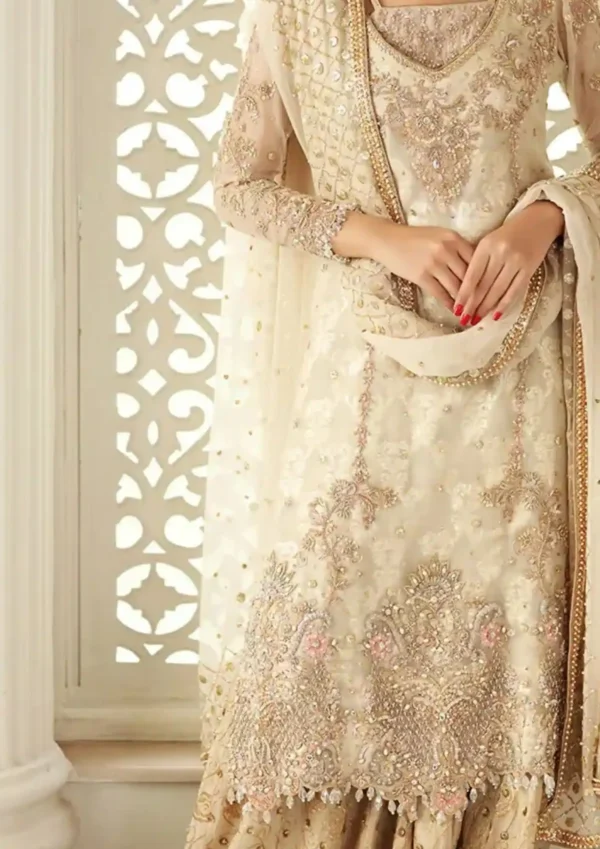 Dress Details: Type: Semi-Stitched (Free Size) and XL (42-inch Full Stitched) Top Fabric: Georgette with embroidery, sequins, and handwork Inner Fabric (Top): Santoon Bottom Fabric: Santoon with heavy work Dupatta: Nazmin with embroidery Measurements: Top Length: Semi-Stitched: Up to 43 inches XL (Full Stitched): 42 inches Top Bust Size: Semi-Stitched: Up to 56 inches XL (Full Stitched): 42 inches Bottom Length: Semi-Stitched: 2.15 meters XL (Full Stitched): Matches 42-inch size Dupatta Length: 2.05 meters Extras: Embroidered with sequins, handwork, and pearl details Wash Care: Dry clean only